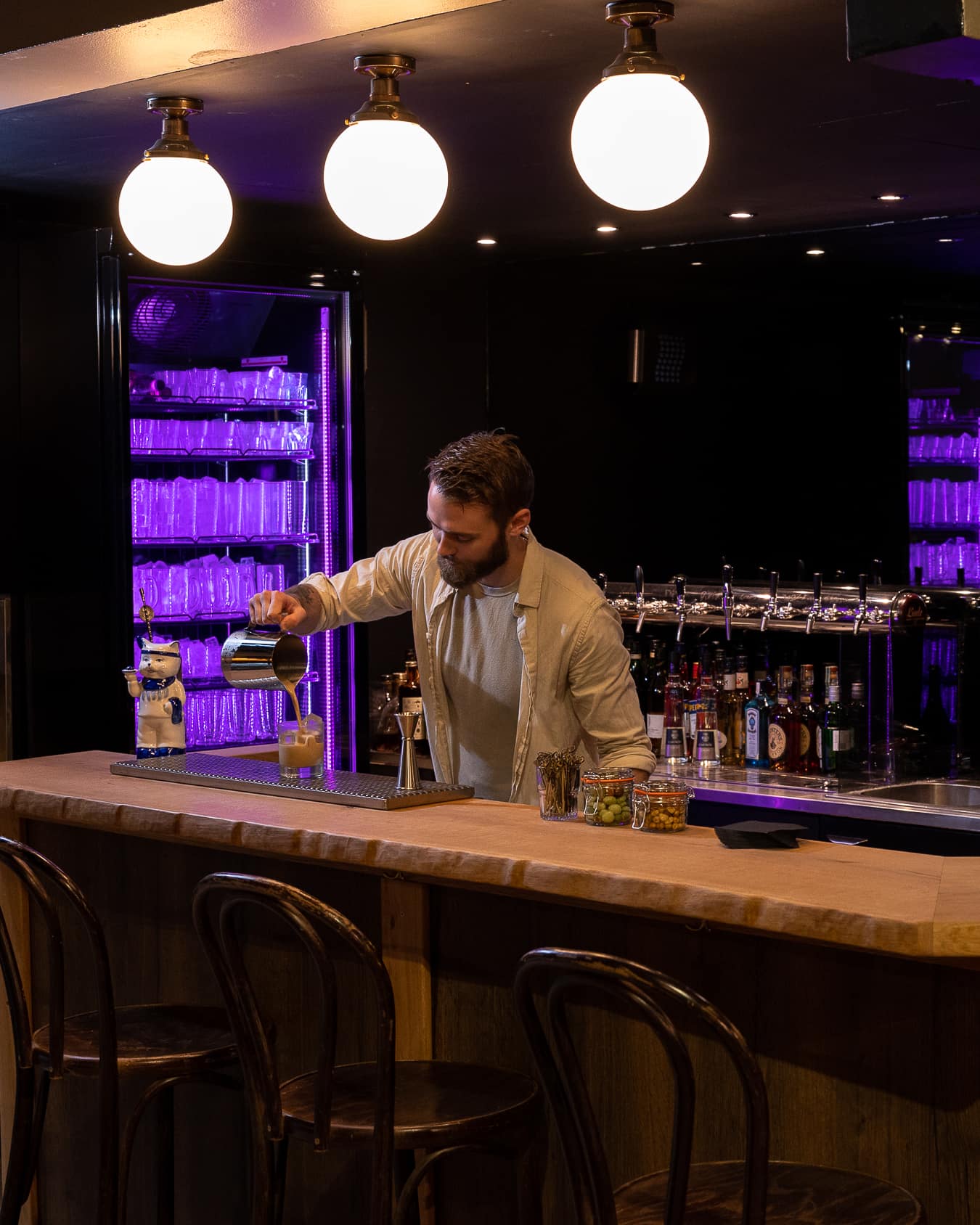 A brewtini being poured behind the bar