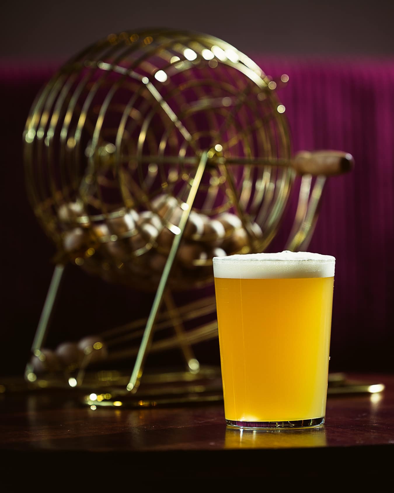 Beer and bar tools arranged on a Bingo cage